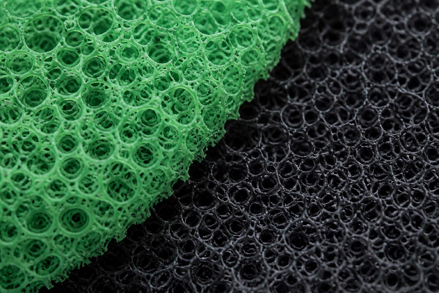 Close-up of open-cell reticulated polyurethane foam used for filtration